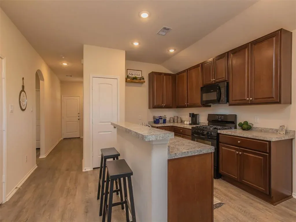 The Village at Granger Pines Apartments with Kitchen Island